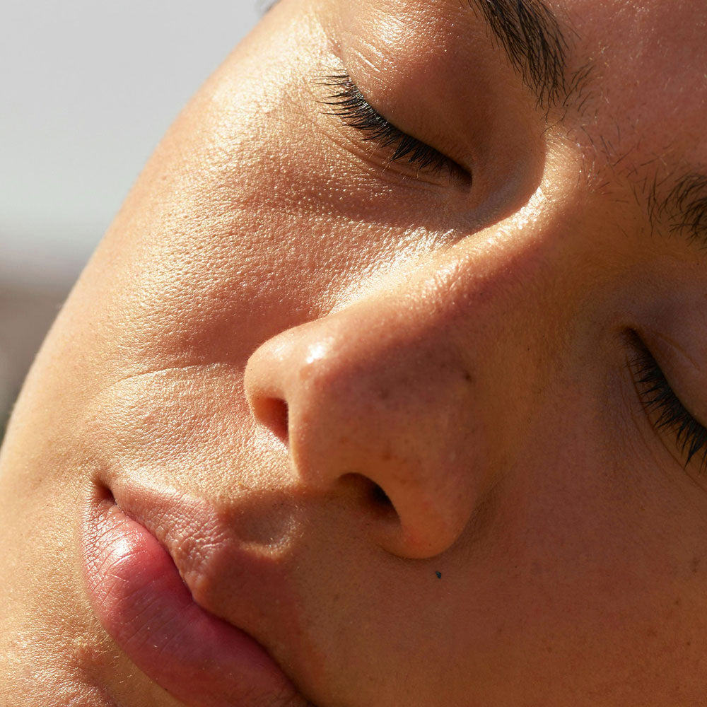 Detail of healthy skin photographed in warm natural light