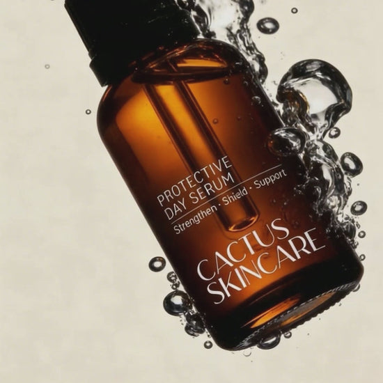 Protective day serum bottle photographed in warm natural light